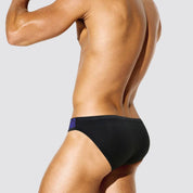 Rear view of Adannu black low-waist hip briefs with a snug fit and smooth fabric for all-day comfort.