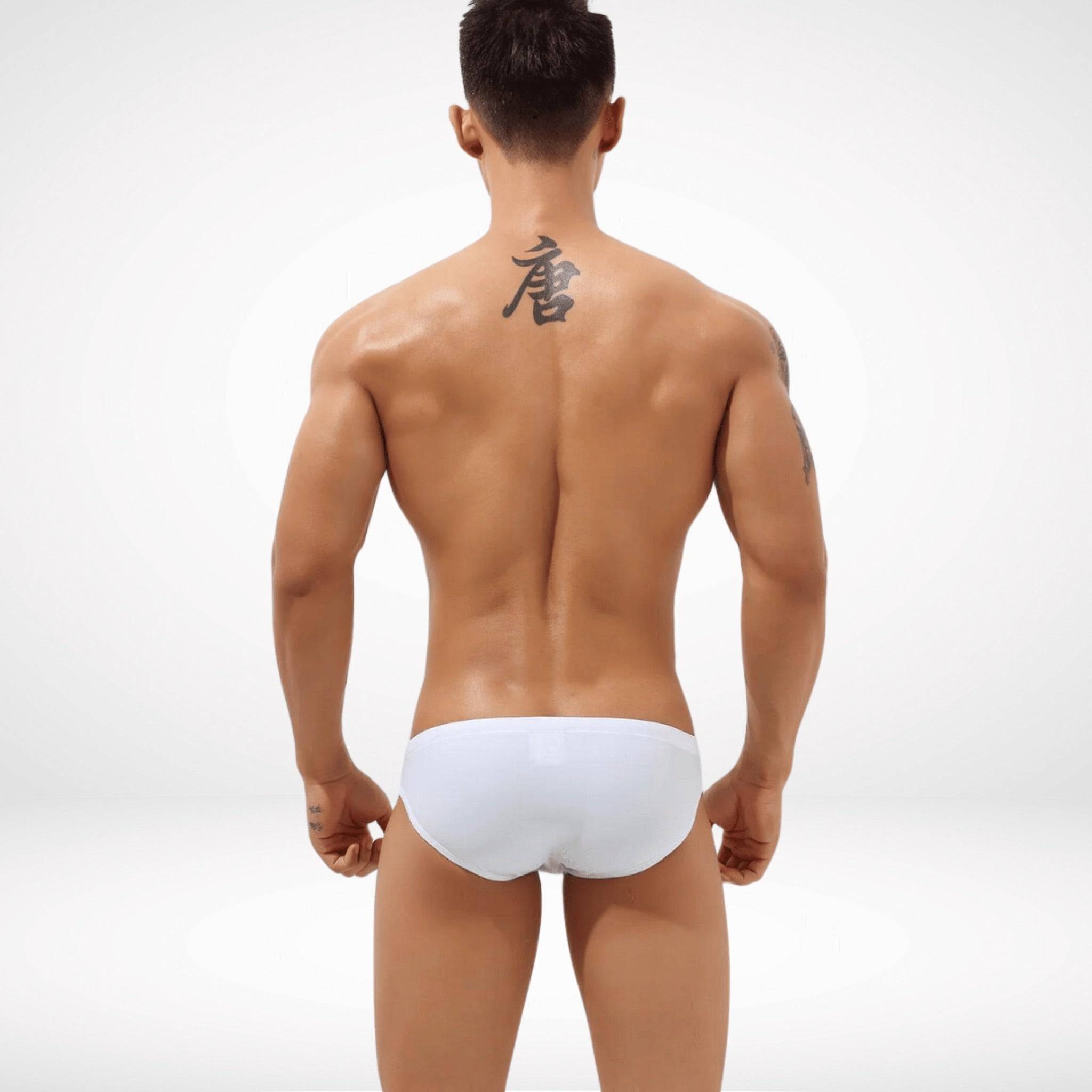 Back view of white Aura Cutout Swim Briefs showcasing a sleek and minimal design for a comfortable and secure fit.