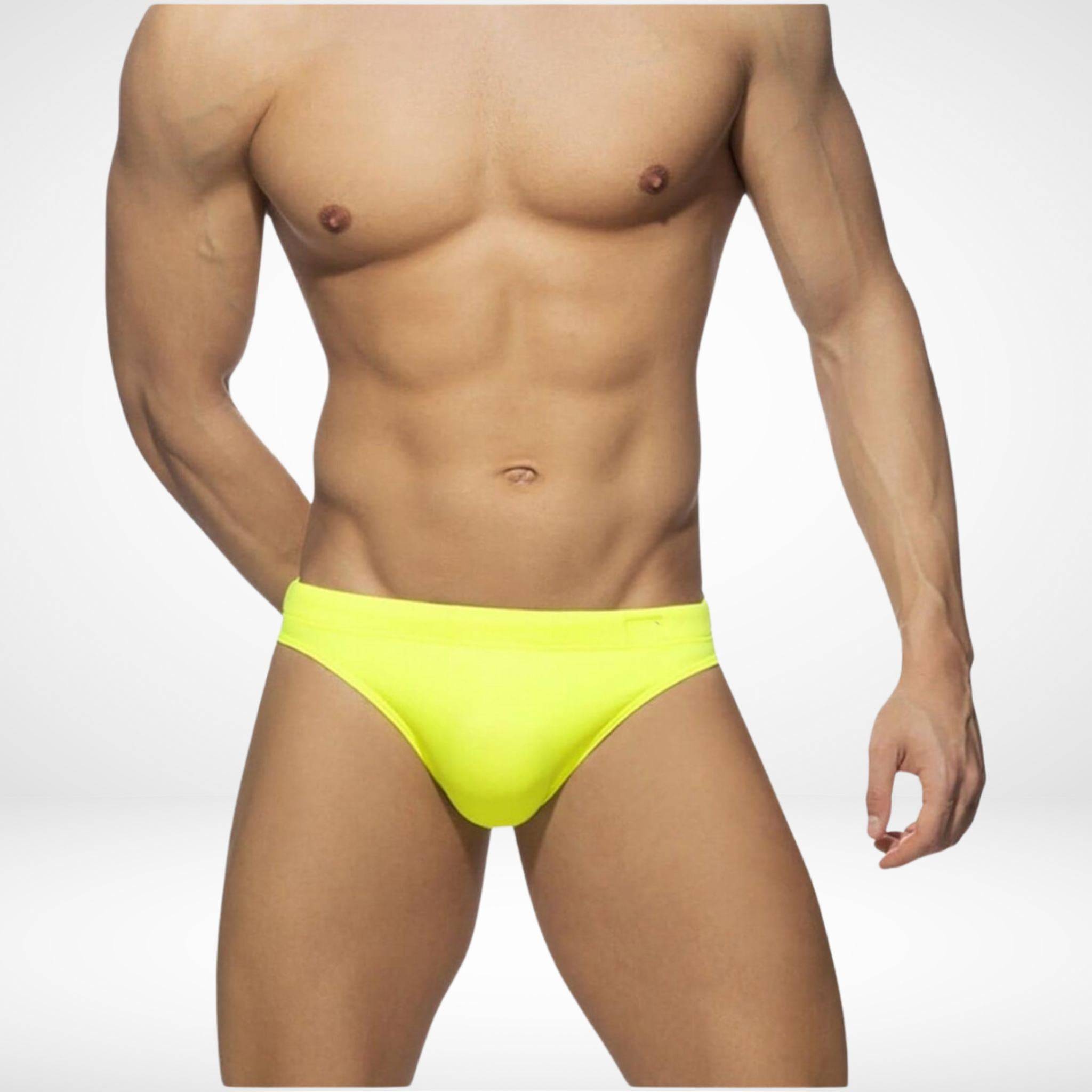 Men's yellow quick-dry swim briefs with a vibrant, stylish design, offering a secure fit and removable pad for versatile swimwear.