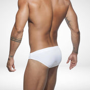 Back view of men's white swim briefs highlighting a snug fit and durable fabric, perfect for beach and pool activities.