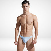 Men's light blue bikini swim briefs with high side cut, highlighting the front view and comfortable low-rise fit for stylish swimwear.