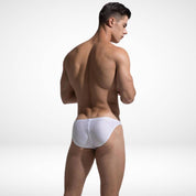 Men's white bikini swim briefs with high side cut, showing a back view and snug fit for a clean and modern swimwear style.