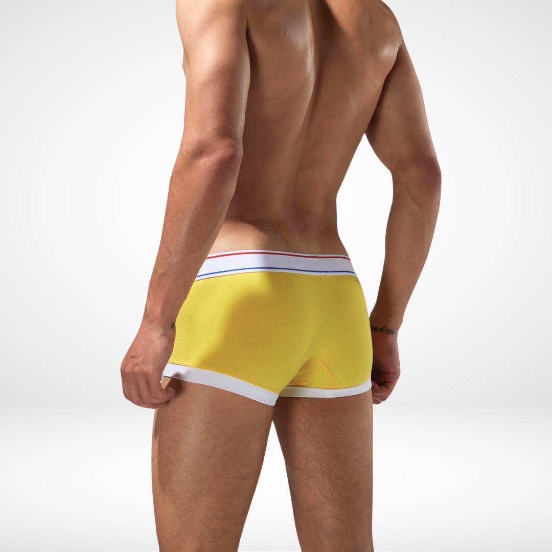 Back view of yellow breathable cotton stretch boxer briefs for men, showcasing white trim and a snug, durable fit.