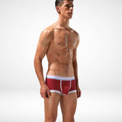 Red breathable cotton stretch boxer briefs for men, designed with white trim and a soft, flexible waistband for daily wear.