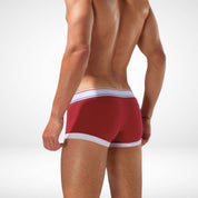 Back view of red breathable cotton stretch boxer briefs for men, showcasing white trim and a snug, durable fit.