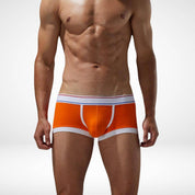 Orange breathable cotton stretch boxer briefs for men with white trim and a flexible waistband, ensuring comfort and style.