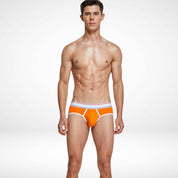 Orange breathable cotton stretch briefs for men featuring white contrast piping and a flexible waistband for comfort.