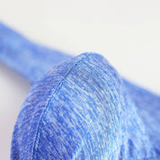 Close-up of blue breathable soft thong underwear fabric, showcasing the soft and stretchy material for enhanced comfort.