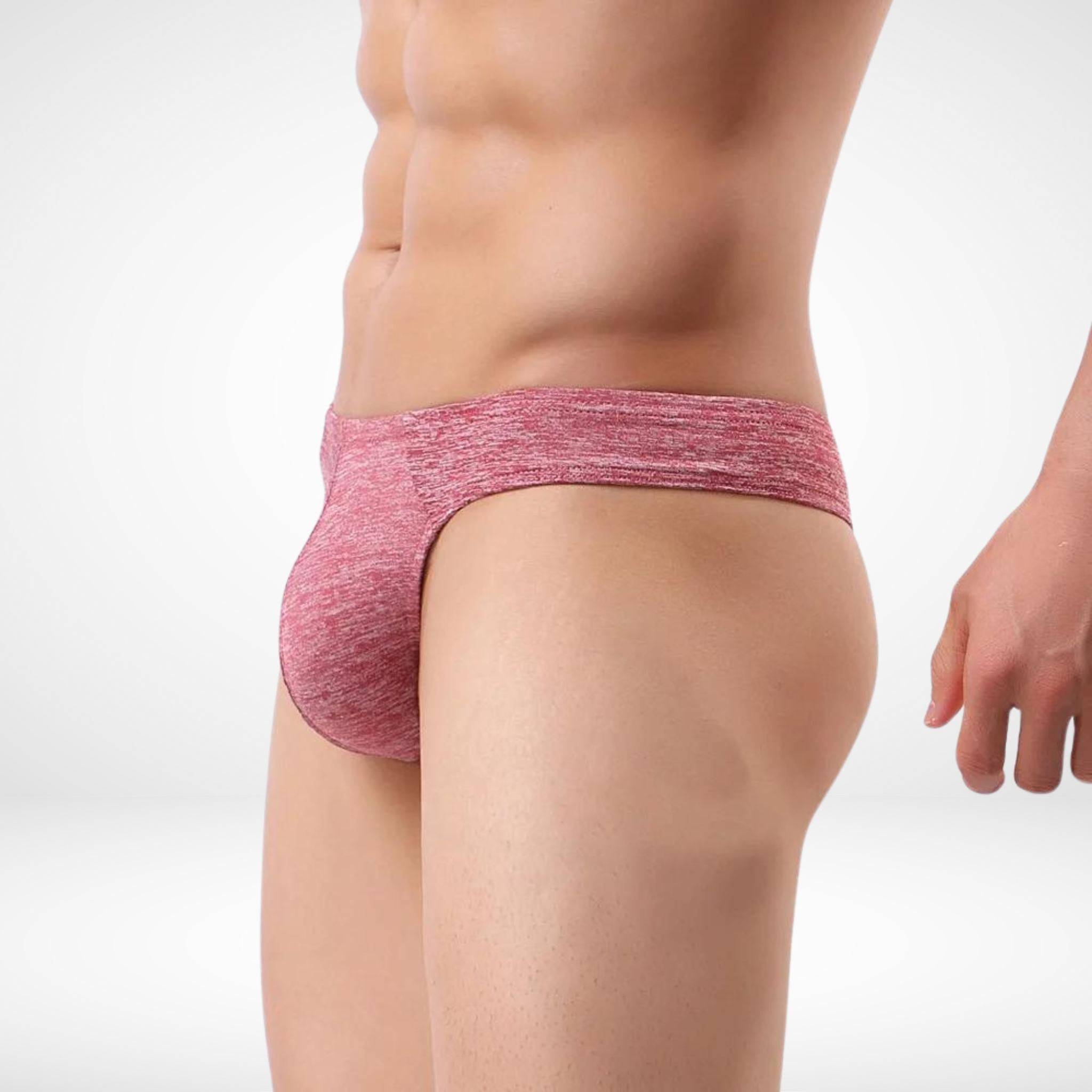 Side view of red breathable soft thong underwear for men, emphasizing the snug fit and breathable fabric.