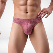 Front view of red breathable soft thong underwear for men, featuring a supportive pouch and minimalistic design.