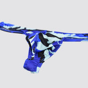 Close-up of blue camo thong showcasing the ergonomic bulge pouch design and durable stitching for enhanced comfort.