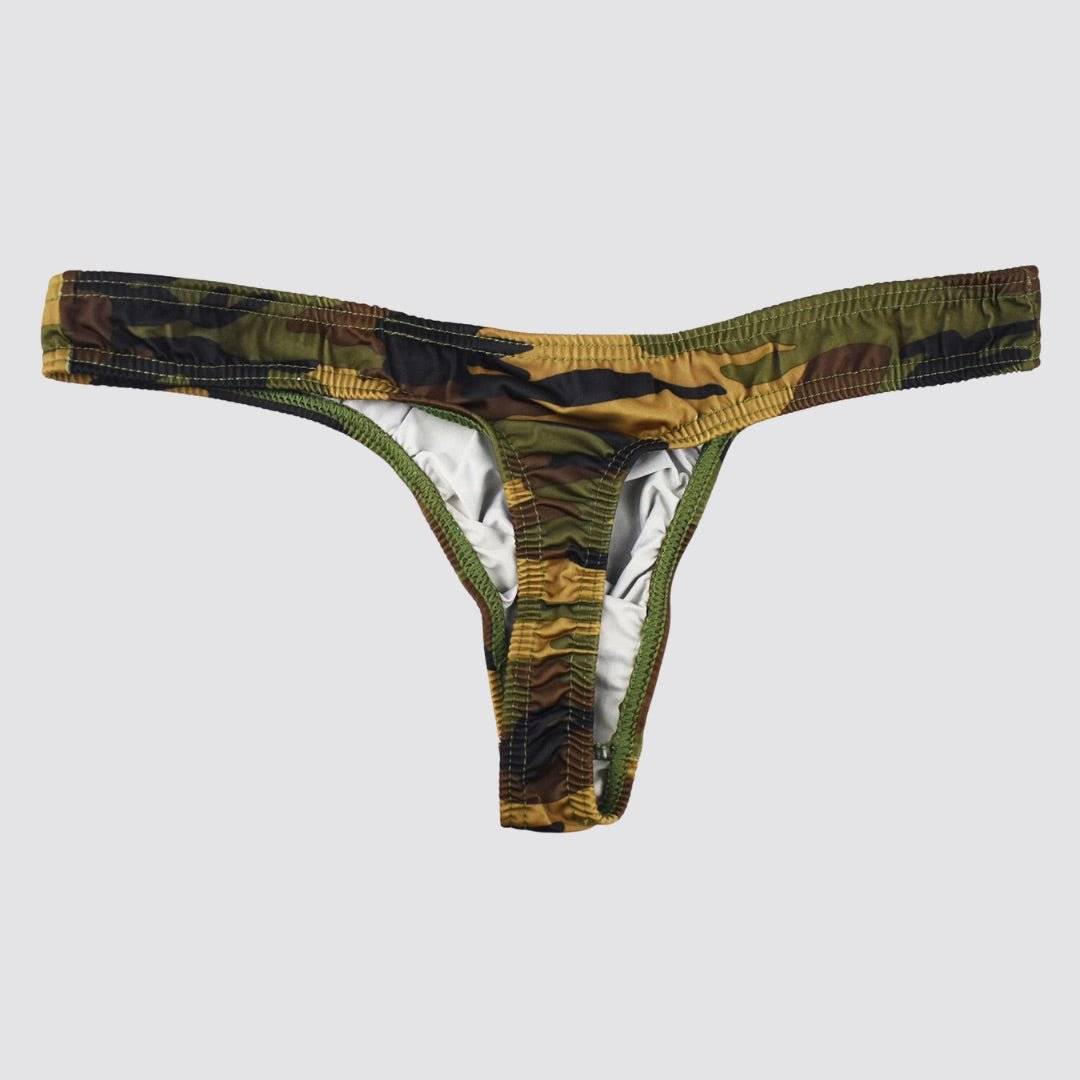 Flat-lay of green camo thong highlighting the elastic waistband and ergonomic bulge pouch for superior comfort.