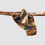 Close-up of brown camo thong's bulge pouch design, highlighting the fade-resistant fabric and precision stitching.