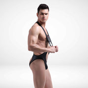 Side view of a men's faux leather open back jockstrap wrestling singlet, emphasizing the bold cutouts and stretchable, breathable fit.