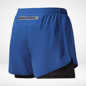 Blue METCON compression lined workout shorts with a built-in liner, zippered back pocket, and laser-punched ventilation for training.