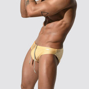 Men's shimmer low rise swim briefs in gold, side view with adjustable drawstring and stretchy, form-fitting design.