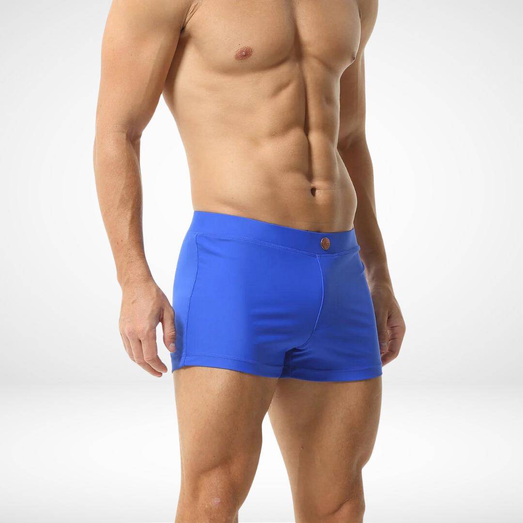 Side view of men's bright blue square cut swim trunks, emphasizing the sleek fit and smooth fabric for a modern swimwear look.