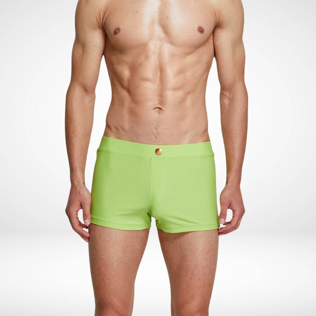 Men's lime green square cut swim trunks with a form-fitting design, made from a quick-dry nylon-spandex blend for a vibrant swimwear choice.