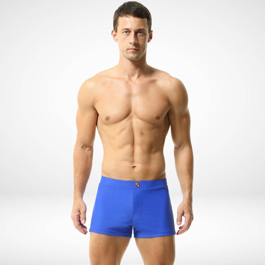 Men's bright blue square cut swim trunks with a form-fitting design, made from a quick-dry nylon-spandex blend for a stylish swimwear choice.