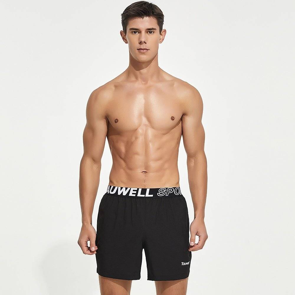 Front view of black men's lined gym training shorts with a Tauwell branded waistband, designed for moisture-wicking and flexibility.