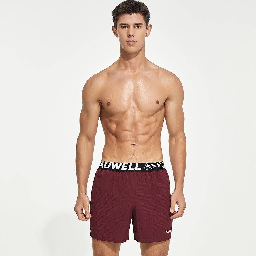 Front view of maroon men's lined gym training shorts with a Tauwell branded waistband, designed for moisture-wicking and flexibility.