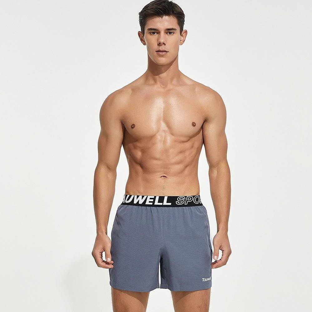 Front view of gray men's lined gym training shorts with a Tauwell branded waistband, offering moisture-wicking and quick-dry comfort.