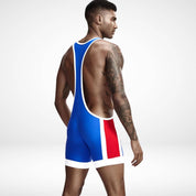 Back view of Tauwell Men's Wrestling Singlet in royal blue with red and white accents, highlighting a racerback design and athletic cut.