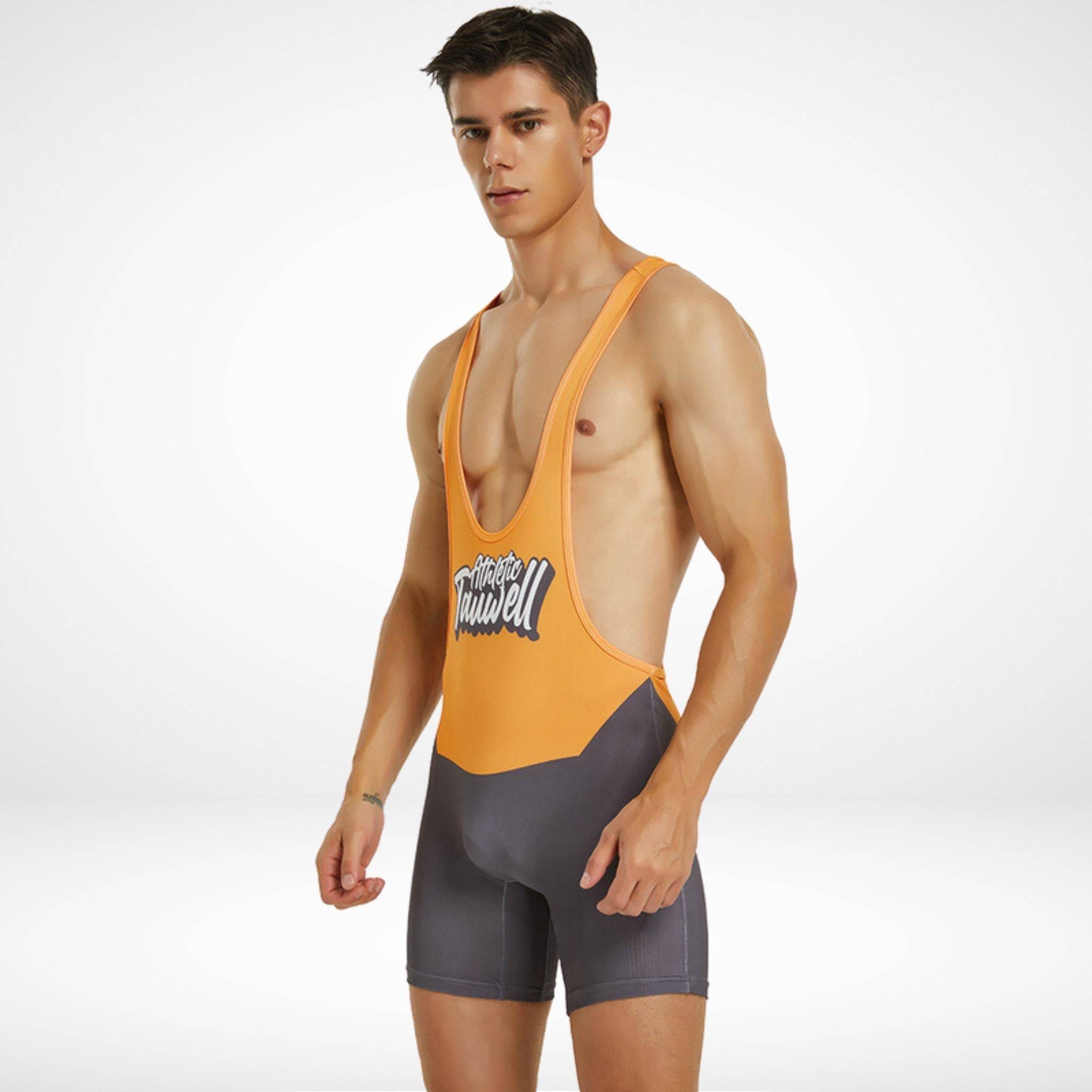 Side view of the Men's Tauwell Wrestling Singlet Bodysuit in orange and gray, highlighting the athletic fit and stretchable fabric.