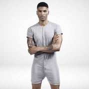 Men's gray union suit onesie with a buttoned-up front, offering a stylish and relaxed loungewear option.