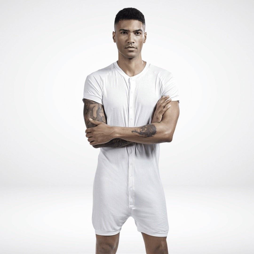 Men's white union suit onesie with a buttoned-up front, offering a sleek and cozy loungewear style.