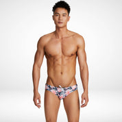 Men's Water Lily Swim Briefs in a dark floral design, featuring a snug fit and adjustable drawstring, ideal for beach or pool activities.