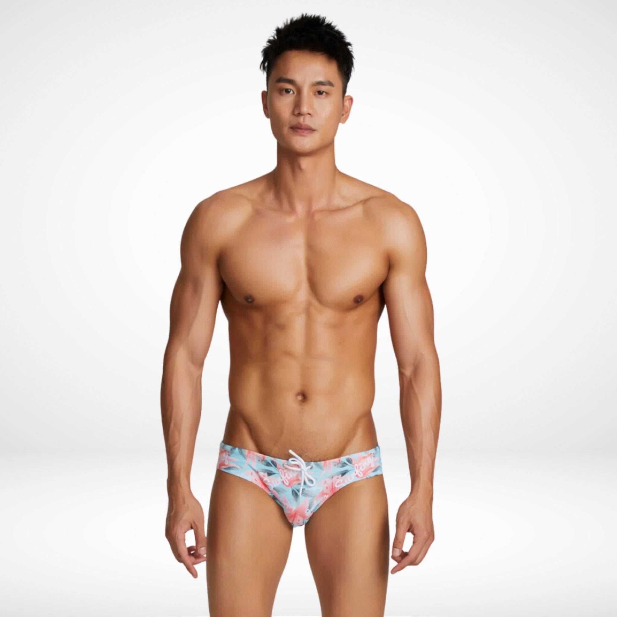 Men's Water Lily Swim Briefs in a light floral design, featuring a modern fit and adjustable drawstring, perfect for poolside or beachwear.