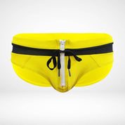 Close-up of yellow and black zipper front swim briefs with a white zipper and drawstring, emphasizing the sporty design.