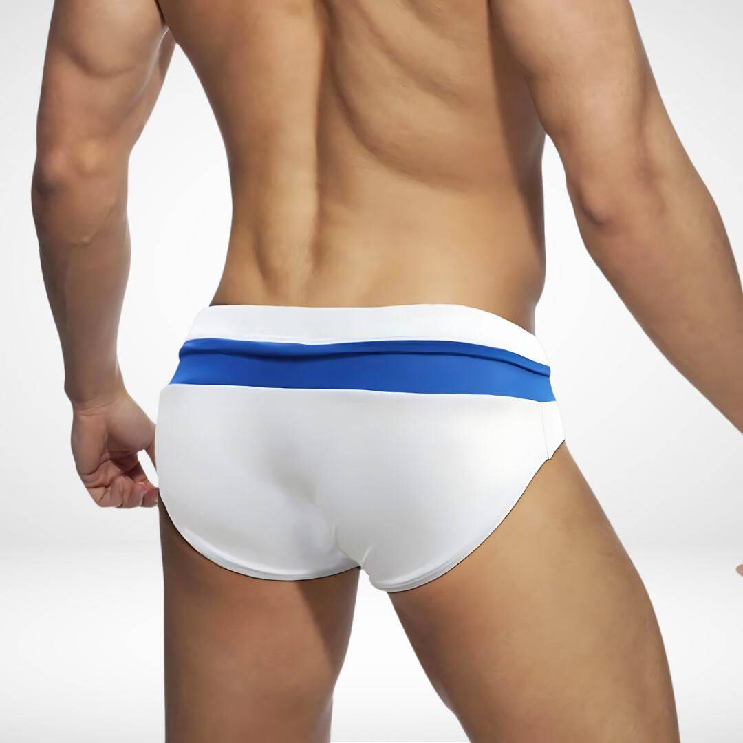 Rear view of white and blue zipper front swim briefs, showcasing a clean and comfortable design for summer activities.