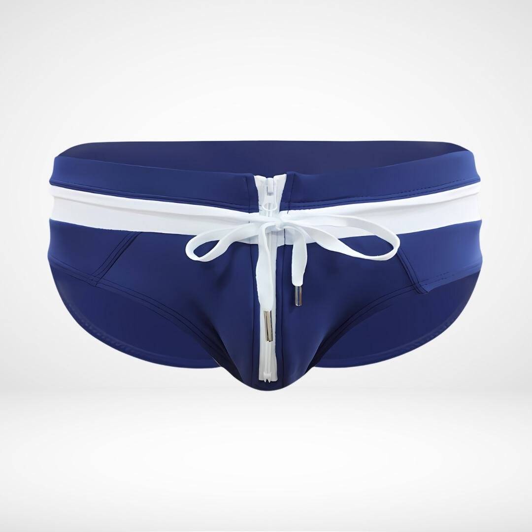 Close-up of navy blue and white zipper front swim briefs featuring a white zipper and drawstring for a refined look.